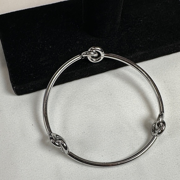 Elegant Silver Tone Knot Bracelet - Picture 4 of 7